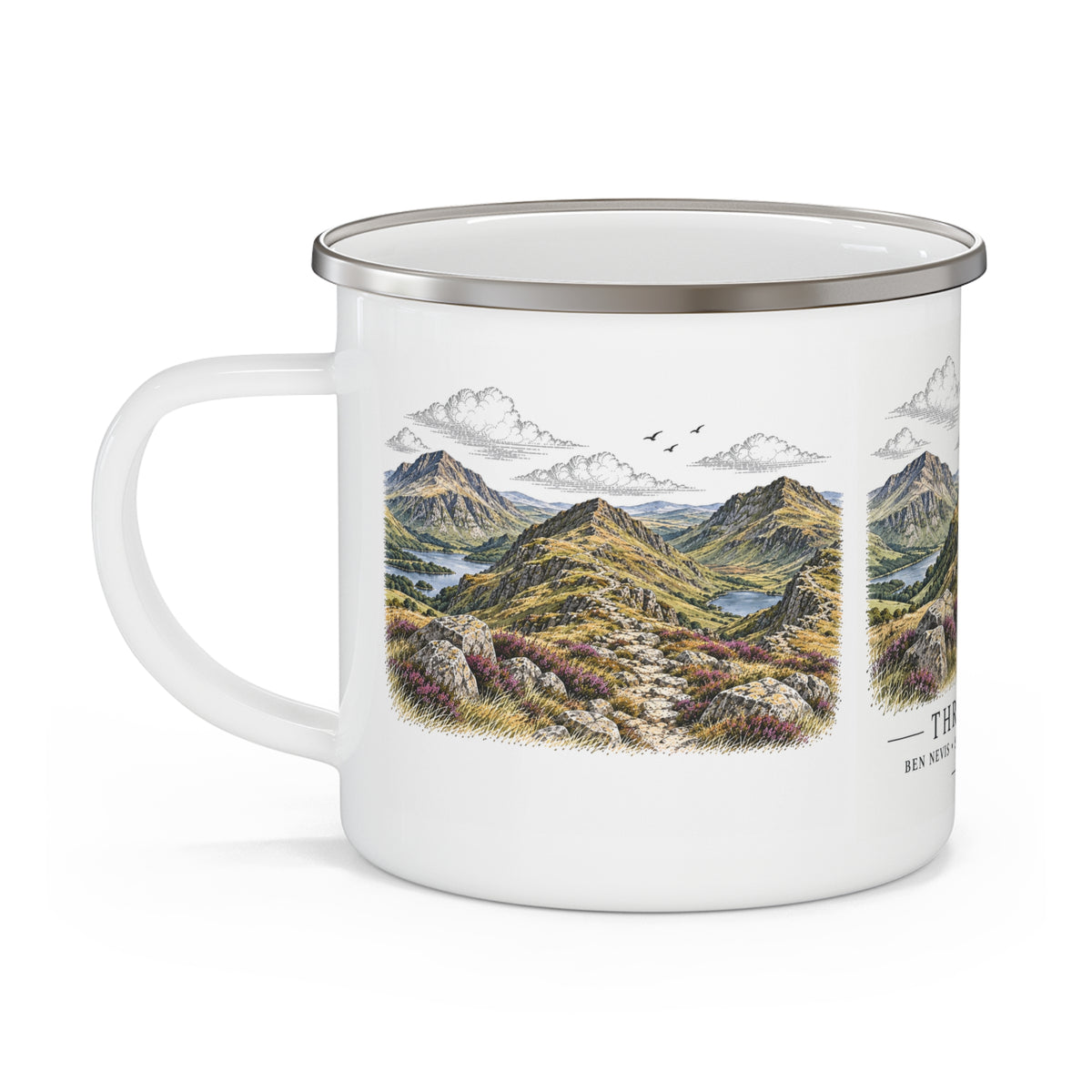 White enamel mug with mountain landscape print and partial "THREE" text, silver rim