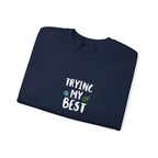 Navy crewneck sweatshirt with "Trying My Best" text graphic on the chest