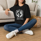 Black T-shirt on model with white globe-and-leaf “Protect Our Planet” front print