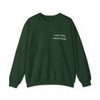 Deep green birthday sweatshirt with 'a year wiser, a world kinder' print