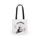 White coffee tote with black handles, “STAY GROUNDED” graphic and coffee mug on front