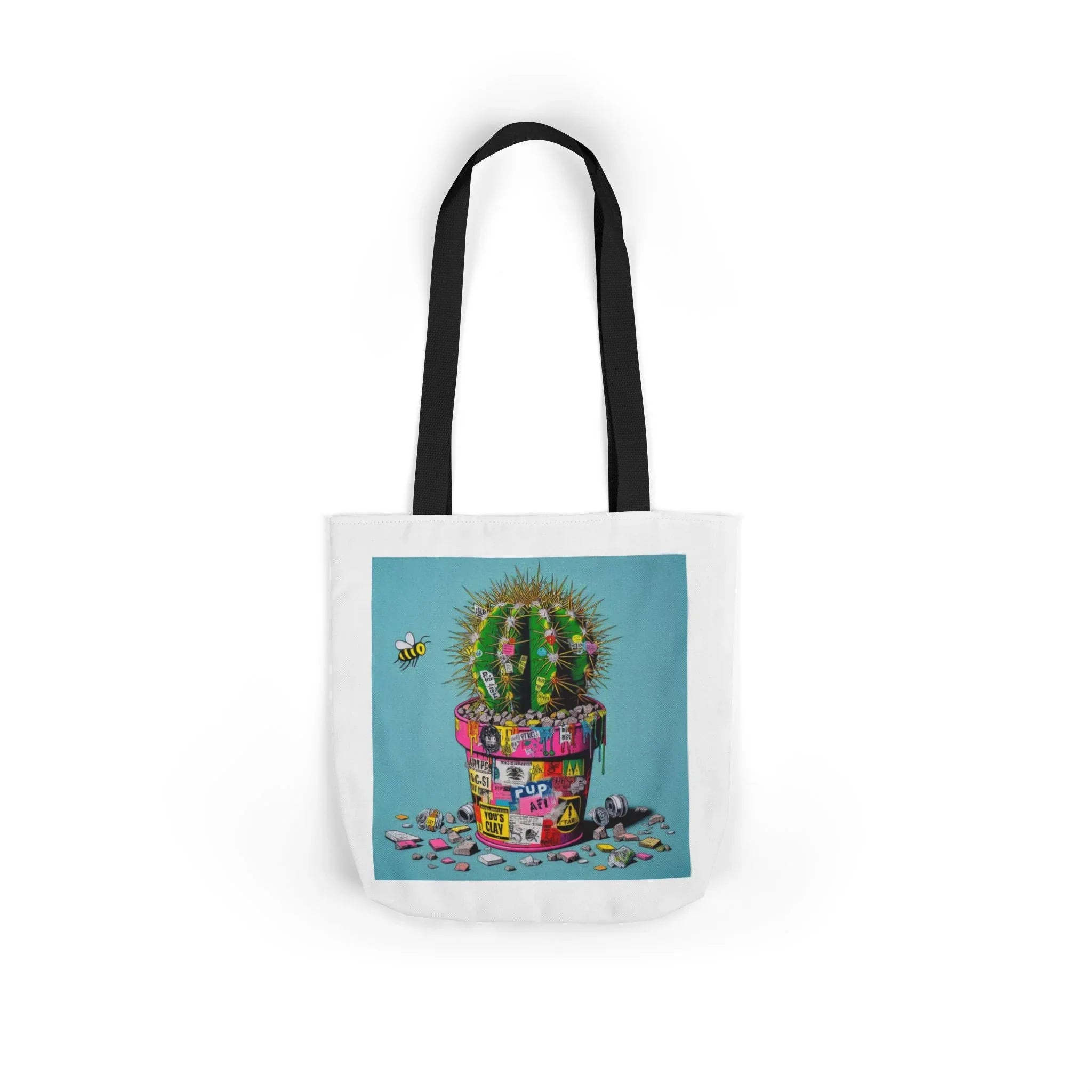 Tote bag with cactus artwork, white body, black handles
