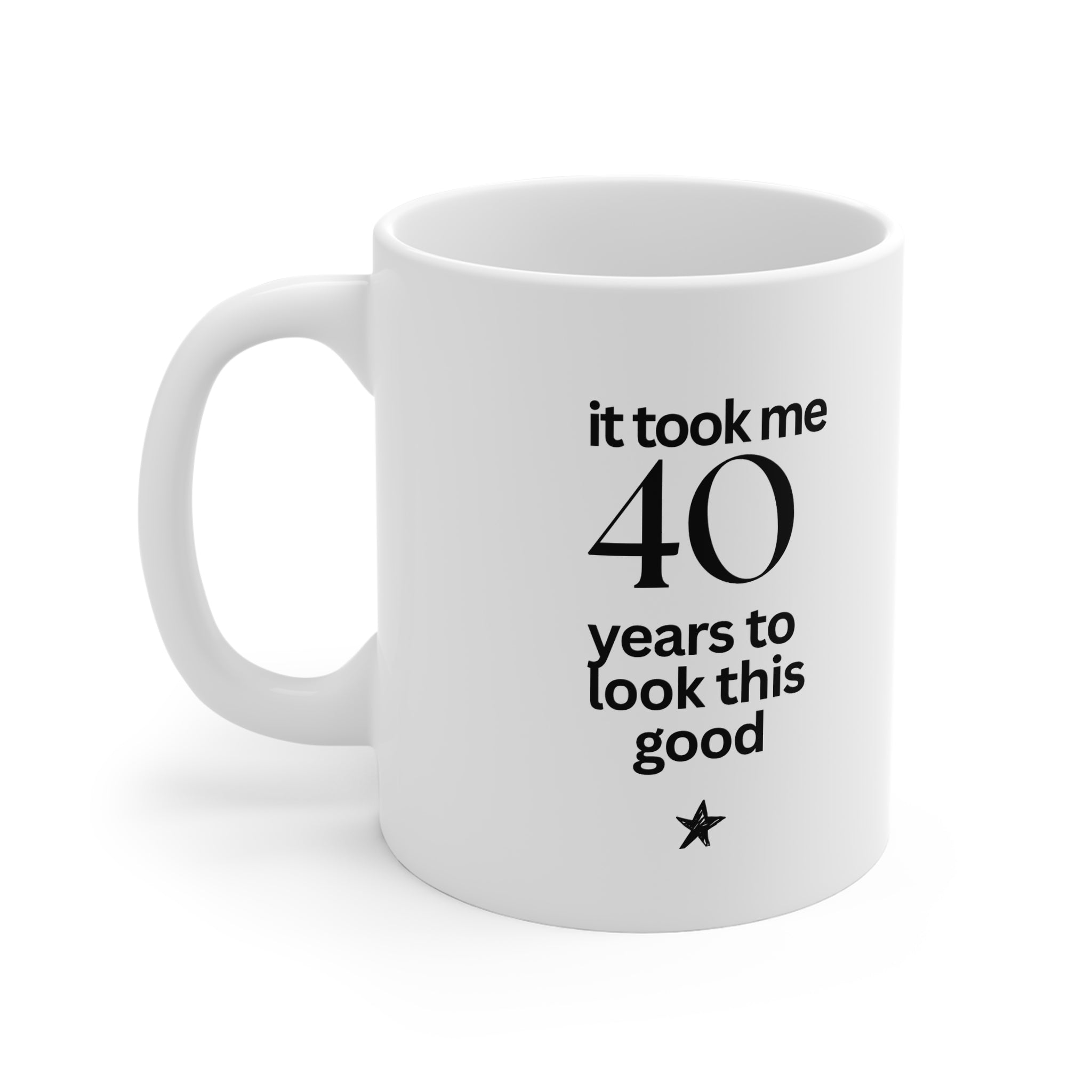 White mug with 'it took me 40 years to look this good' text and star