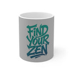 White ceramic coffee mug with teal “Find Your Zen” slogan graphic, front view