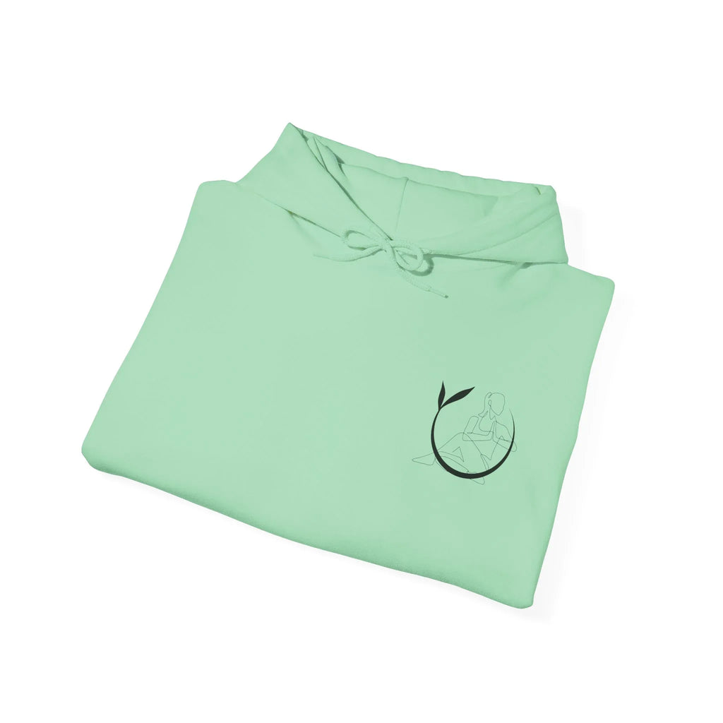 Mint green yoga hoodie, folded with black yoga figure logo