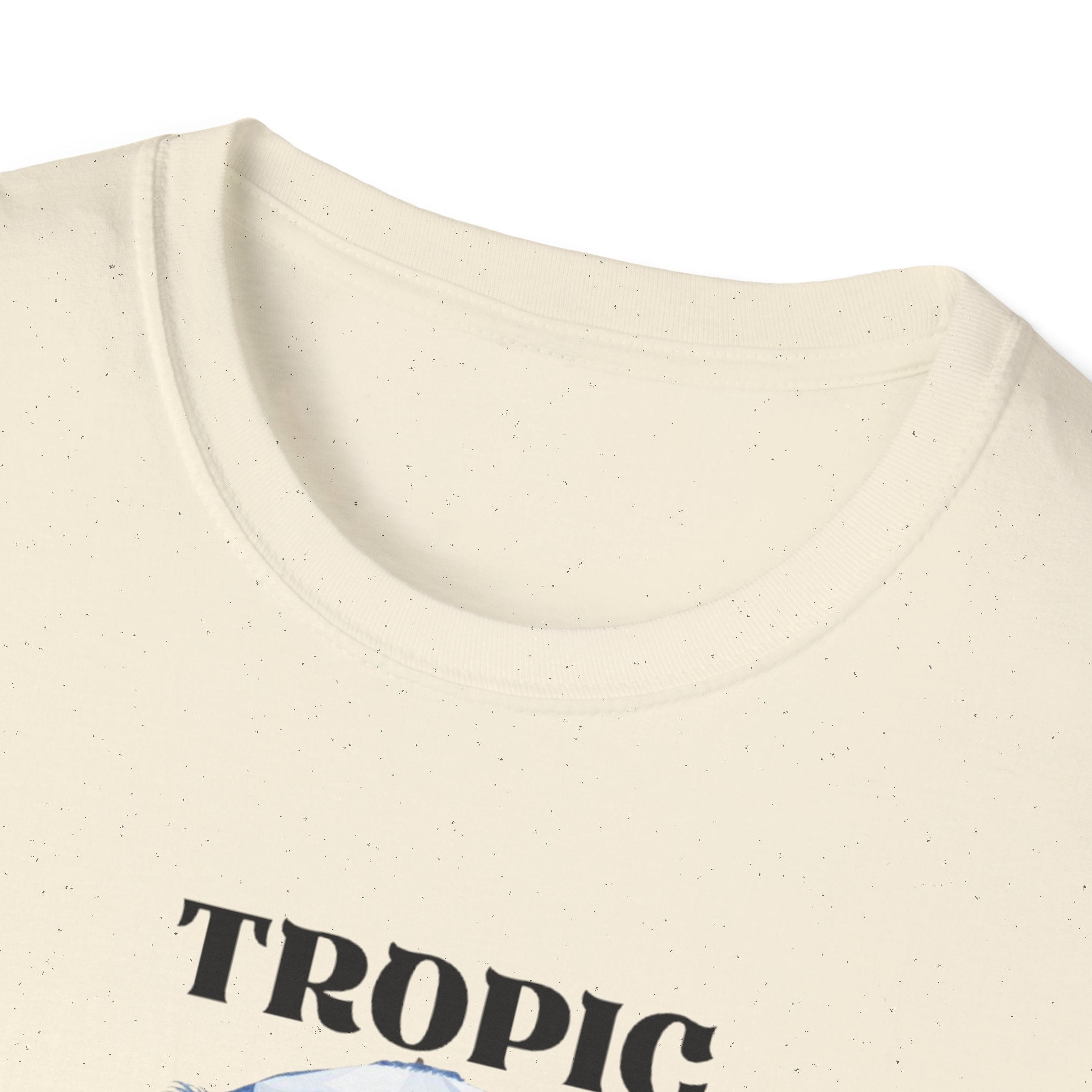 Natural/cream T-shirt close-up of neckline and large "TROPIC" text.