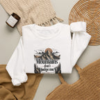 White sweatshirt with front mountain quote graphic print, folded