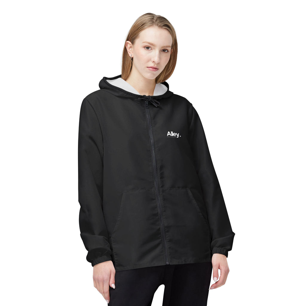 A model with blonde hair wearing the jacket with the alley logo on the top right chest area.