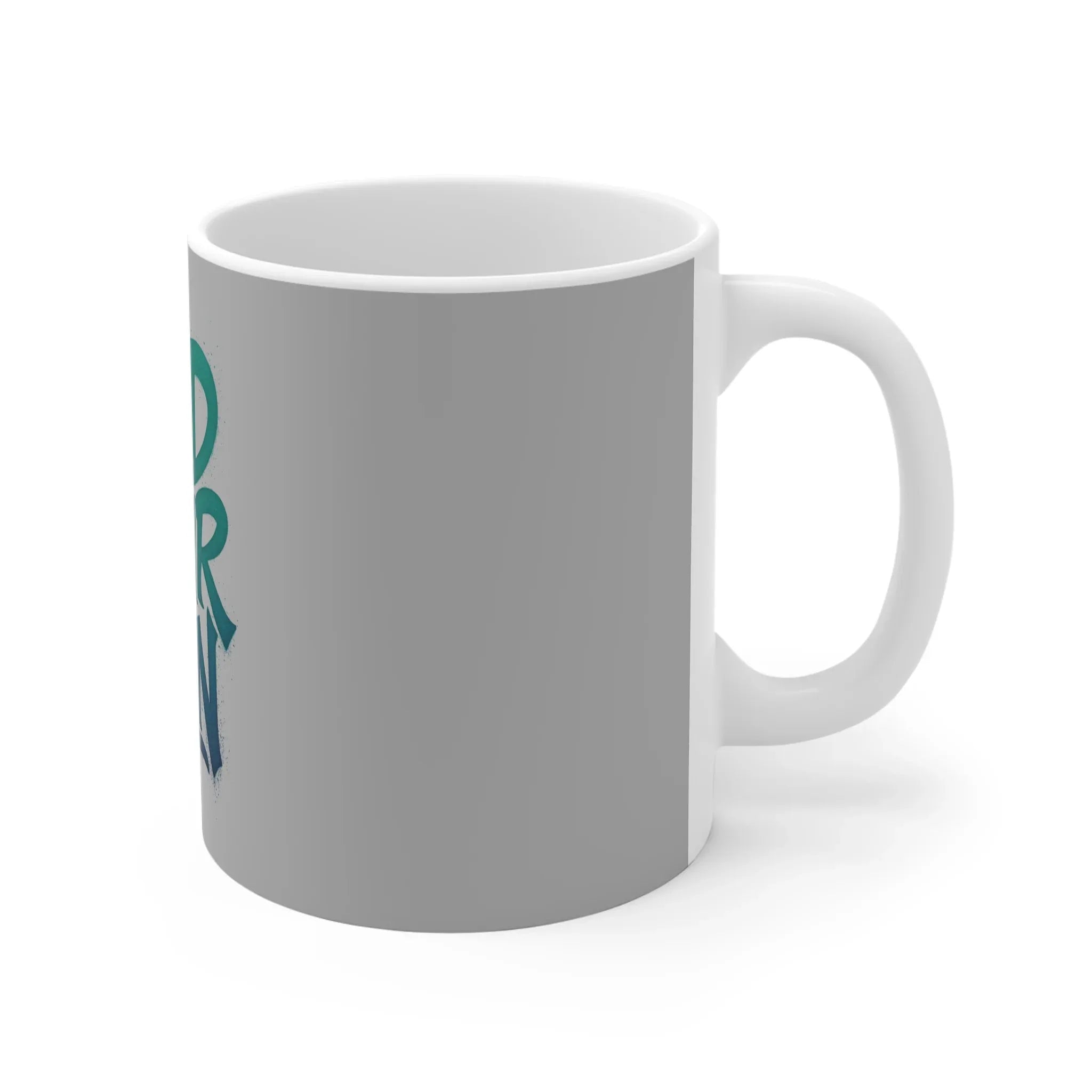 White ceramic coffee mug with partial teal “Find Your Zen” graphic, side view