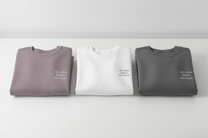 My sister knows too much funny slogan printed on a minimalist unisex sweatshirt”

