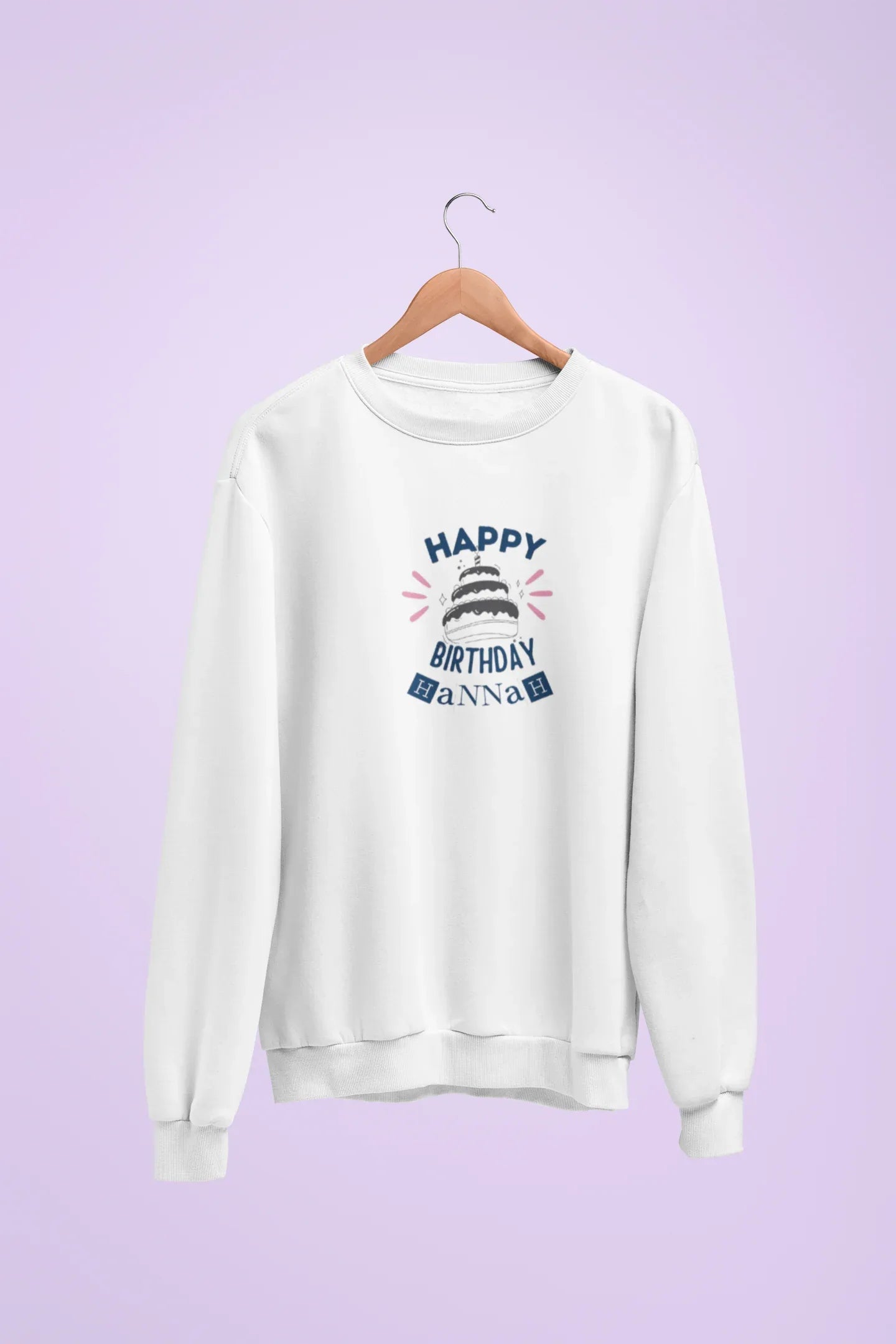 White sweatshirt with 'Happy Birthday' cake graphic and custom name text