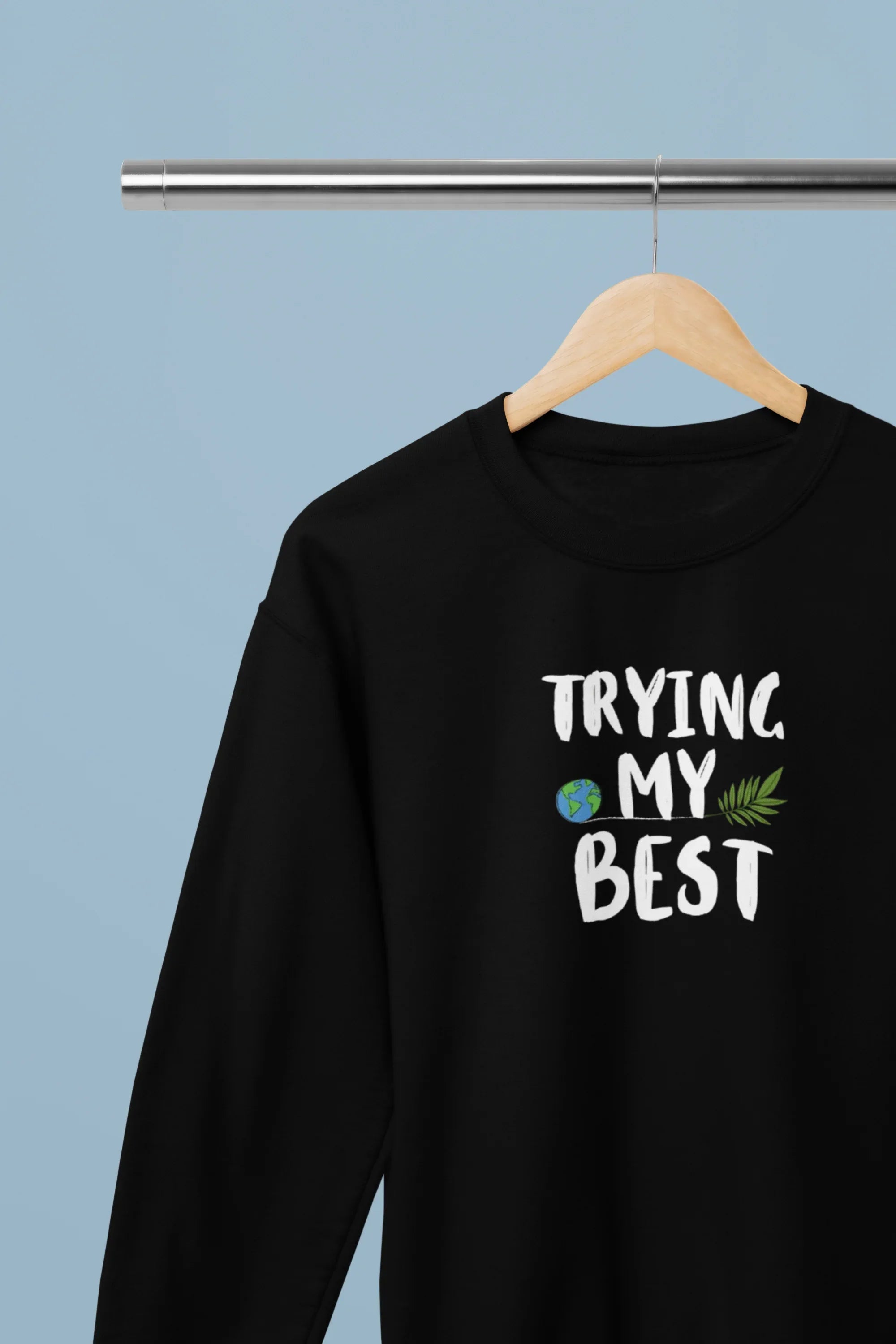 Black crewneck sweatshirt with "Trying My Best" text graphic on the chest