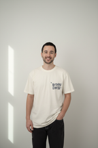 White crew-neck short-sleeve T-shirt with 'Birthday Energy' chest print