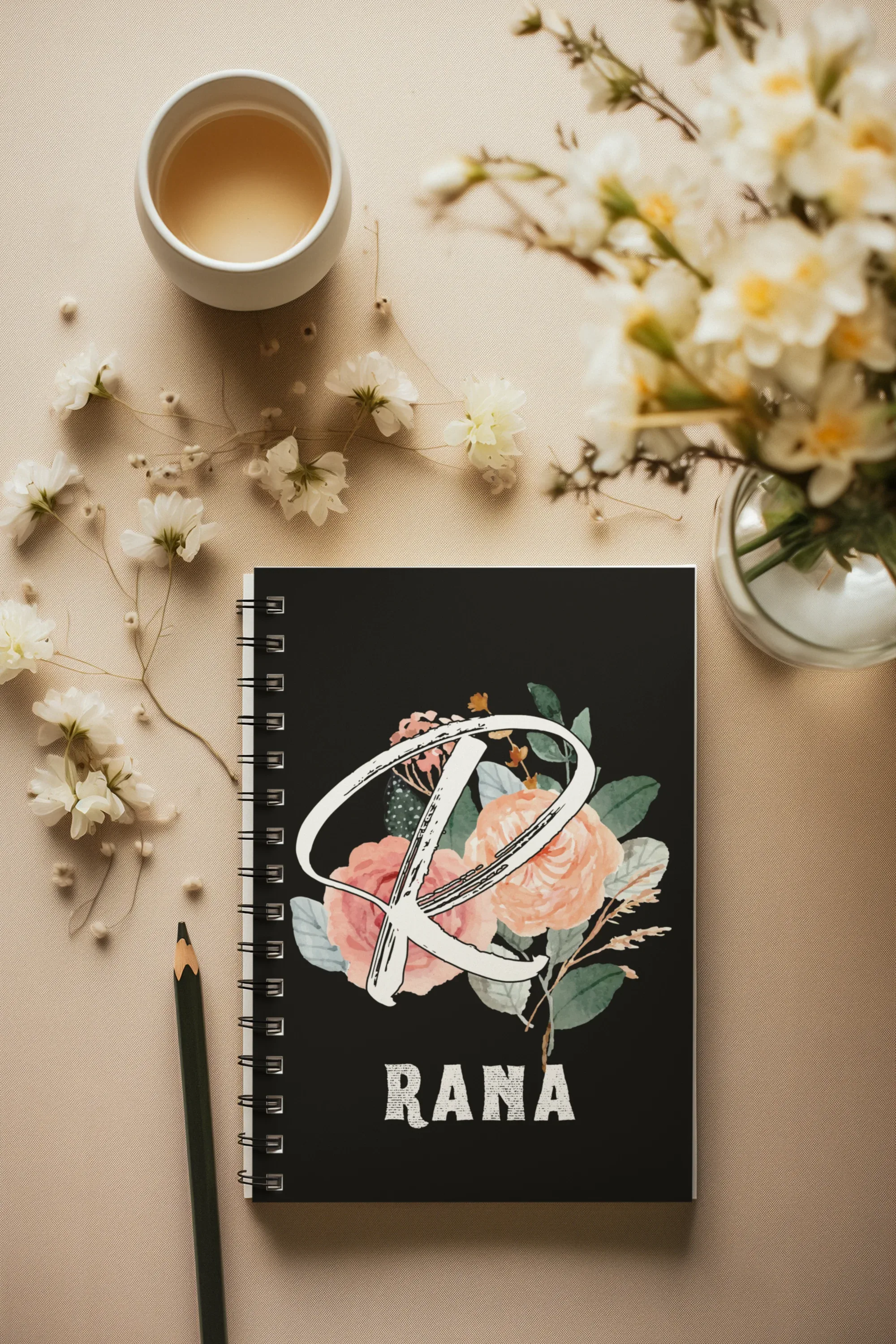 Floral A5 wirobound notebook with black cover, wiro spiral, floral letter and RANA