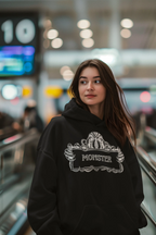 Black Monster Hooded Sweatshirt worn, featuring white monster logo on front