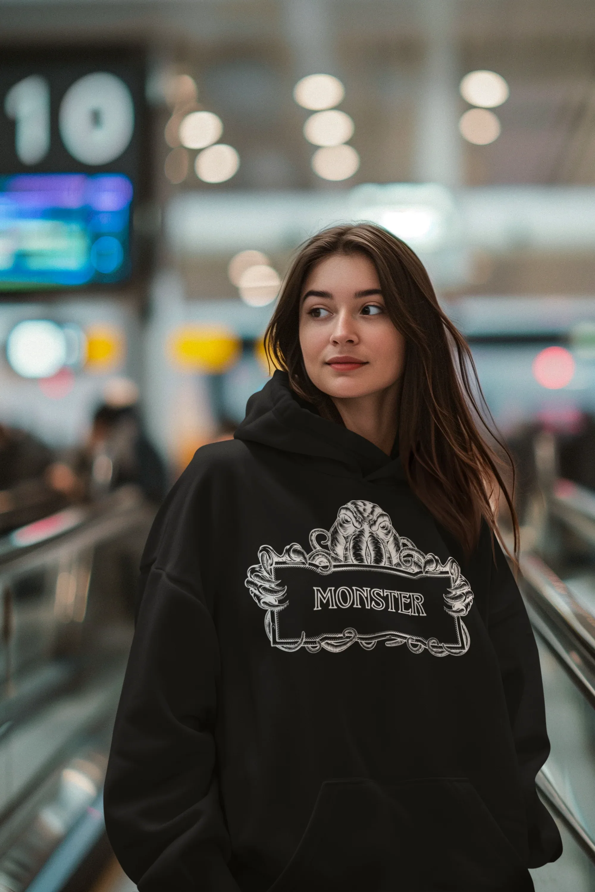 Black Monster Hooded Sweatshirt worn, featuring white monster logo on front