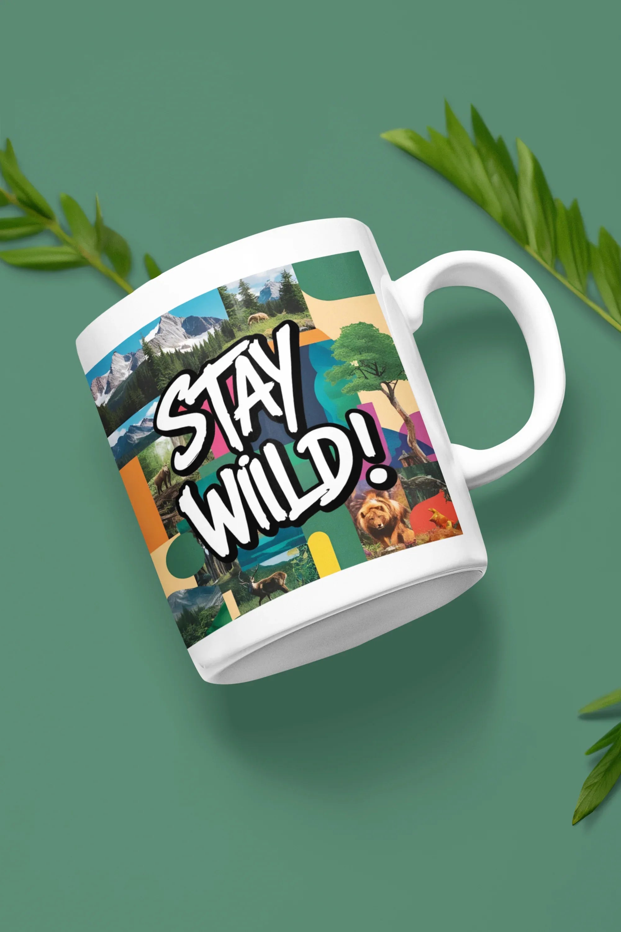 White ceramic mug with 'STAY WILD!' landscape graphic, side view with handle