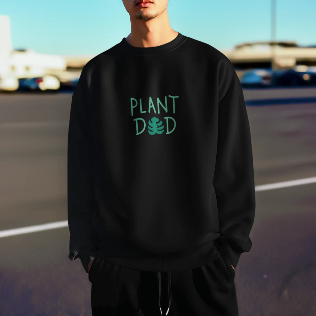 Deep black crewneck sweatshirt with Plant Dad graphic on the chest, long sleeves