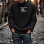 Black crewneck sweatshirt with chest print 'I got gifted this from my kids'
