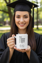 Aisha — graduate holding mug UGC mockup