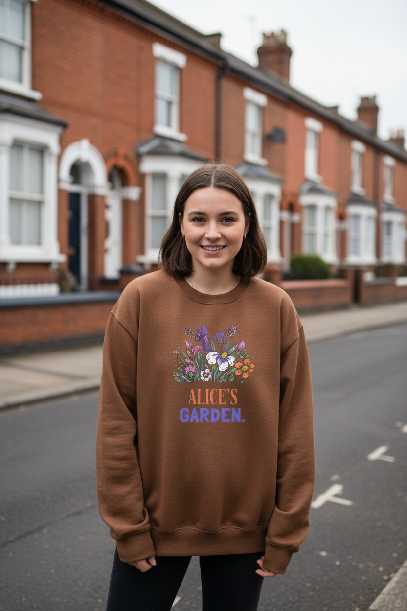 Brown crewneck sweatshirt with floral “Alice's Garden” name print on front
