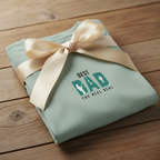 Light teal T-shirt with “Best Dad” retro graphic print, wrapped with ribbon bow