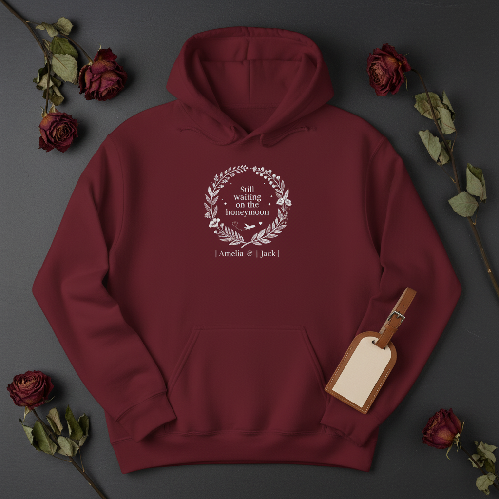 Burgundy personalized couples hoodie, wreath logo and couple names printed on front