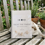 A5 lined notebook with cream cover, moon design, Trust the Timing of Your Life—AMELIA