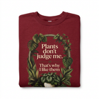 Antique cherry red sweatshirt with large plant quote graphic on front