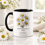 Personalised birth flower mug with black handle; April daisy; name EMMA.