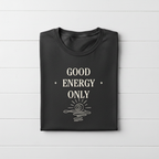 Charcoal t-shirt with “GOOD ENERGY ONLY” graphic and small sparkle icons on the front.