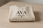 Cream personalised sweatshirt with 'AVA' Est.2021 front print and small heart