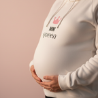 White hoodie front with pink crown and “MINI queen” text under hood opening