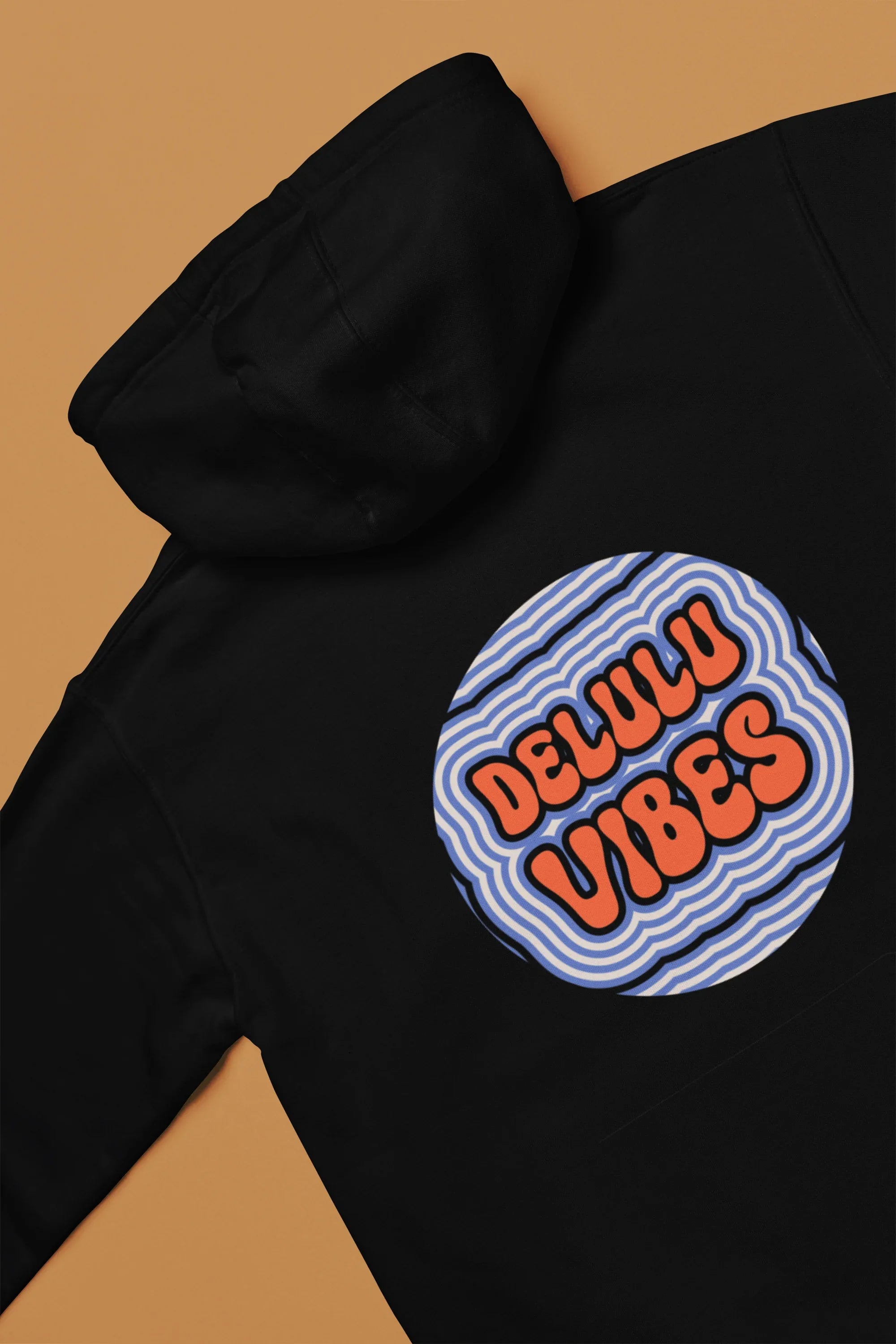 Black hoodie sleeve and chest with circular retro slogan patch