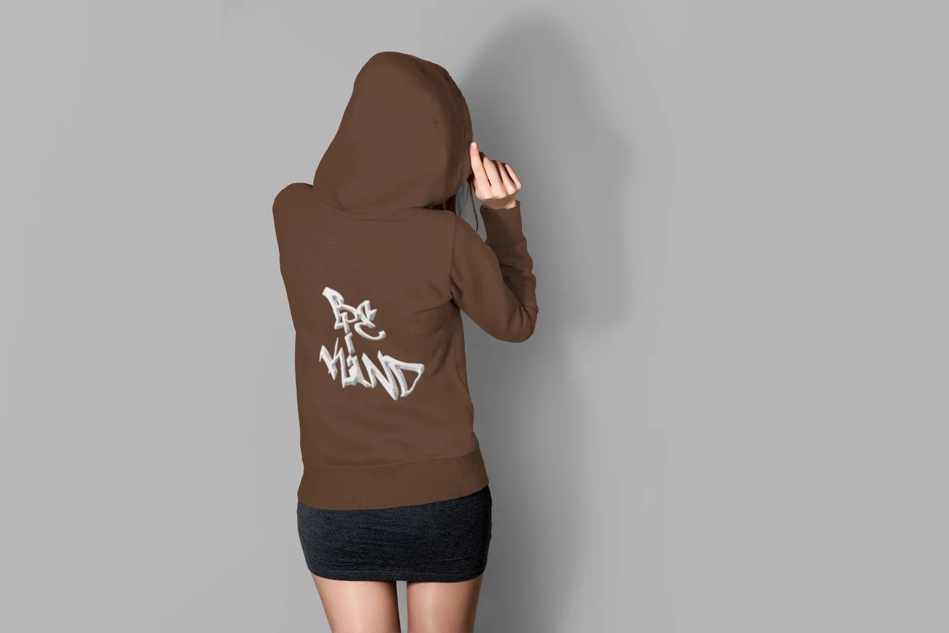 Brown hoodie with front pocket and white graphic print on back, adjustable hood.