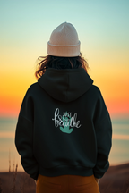 Black hoodie with kangaroo pocket and 'Just Breathe' logo on back