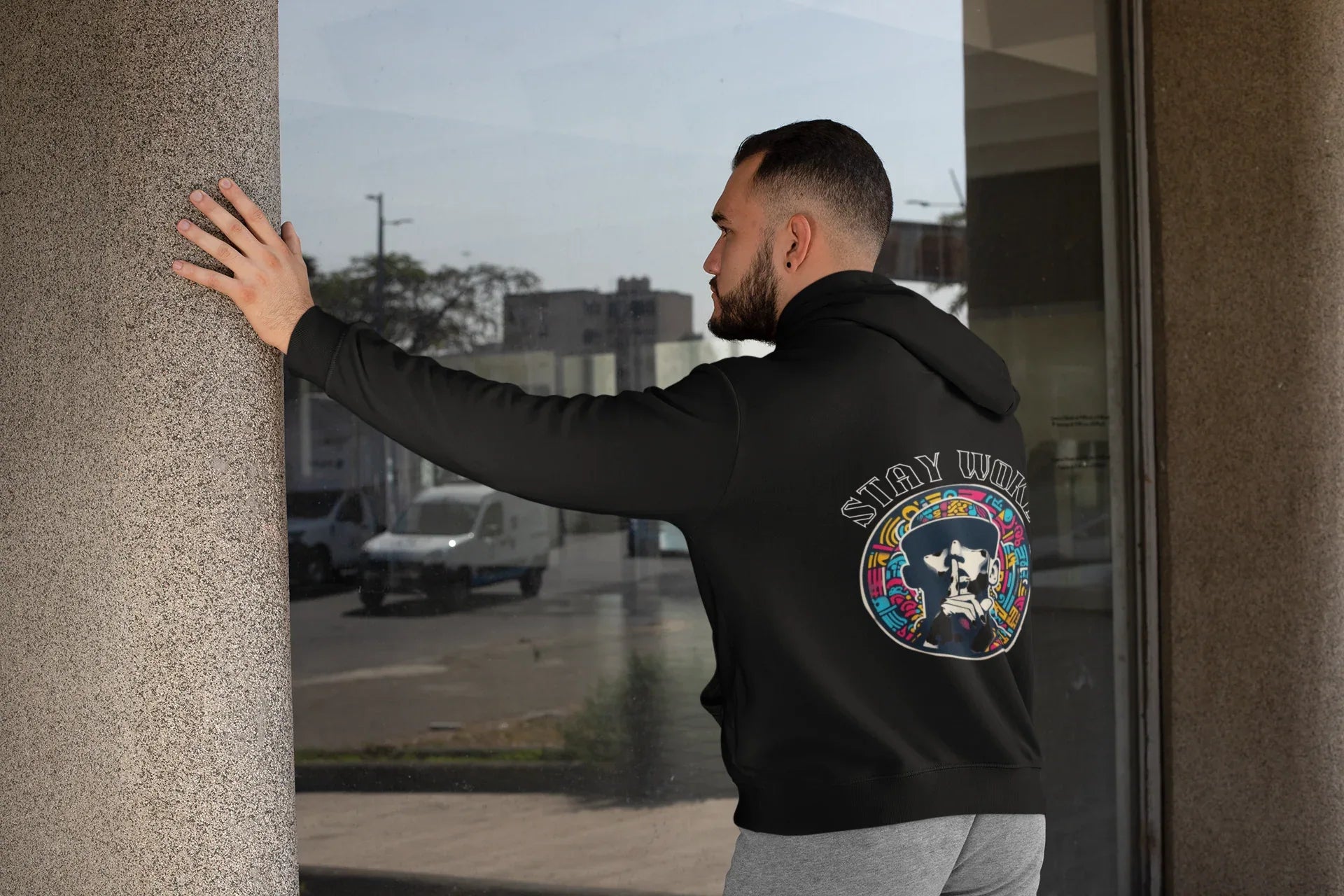 Black hooded sweatshirt with back logo print and hooded neckline