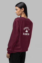 Burgundy crewneck sweatshirt with 'Bloom Era' back graphic