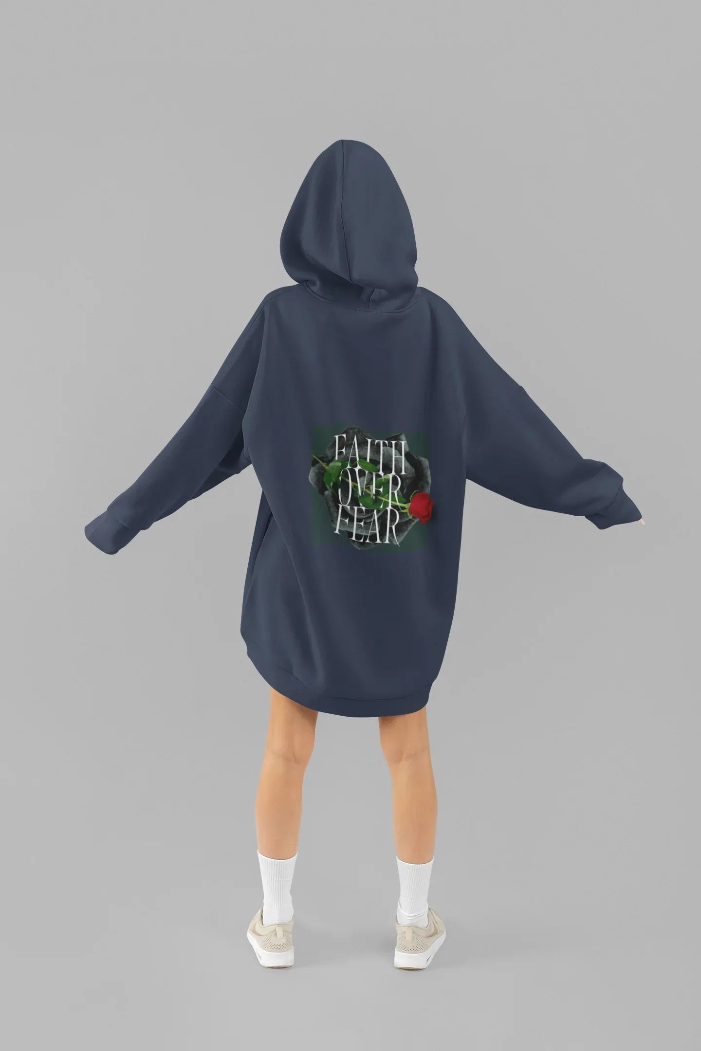 Blue unisex hoodie with hood, front pocket, and Faith over Fear rose back graphic