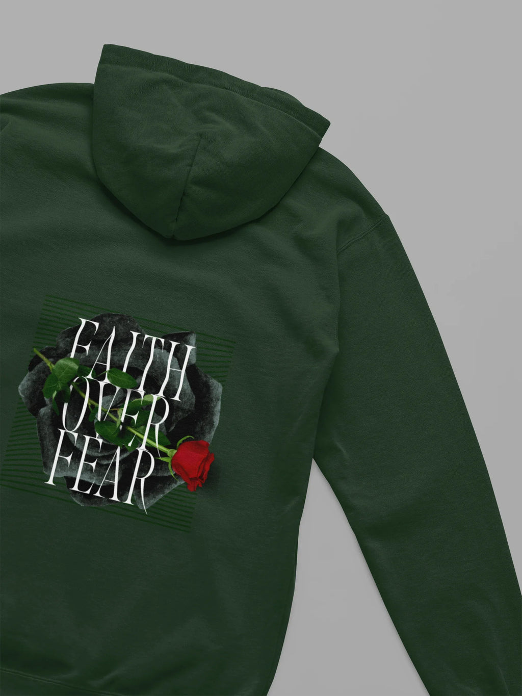 Forest green unisex hoodie with hood and Faith over Fear rose logo graphic