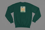 Green sweatshirt back view with small square “Like a Pine” logo centered