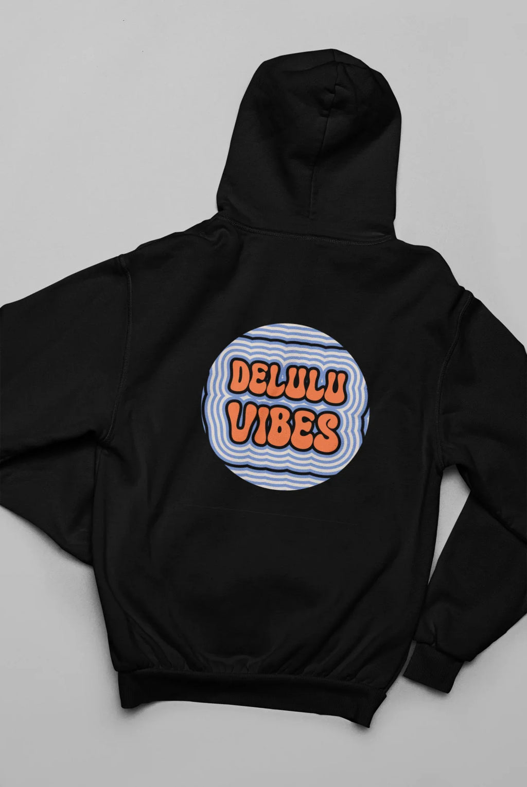 Black pullover hoodie with front pocket and circular "DELULU VIBES" graphic