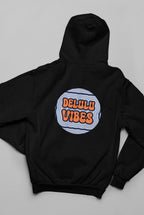 Black pullover hoodie with front pocket and circular "DELULU VIBES" graphic