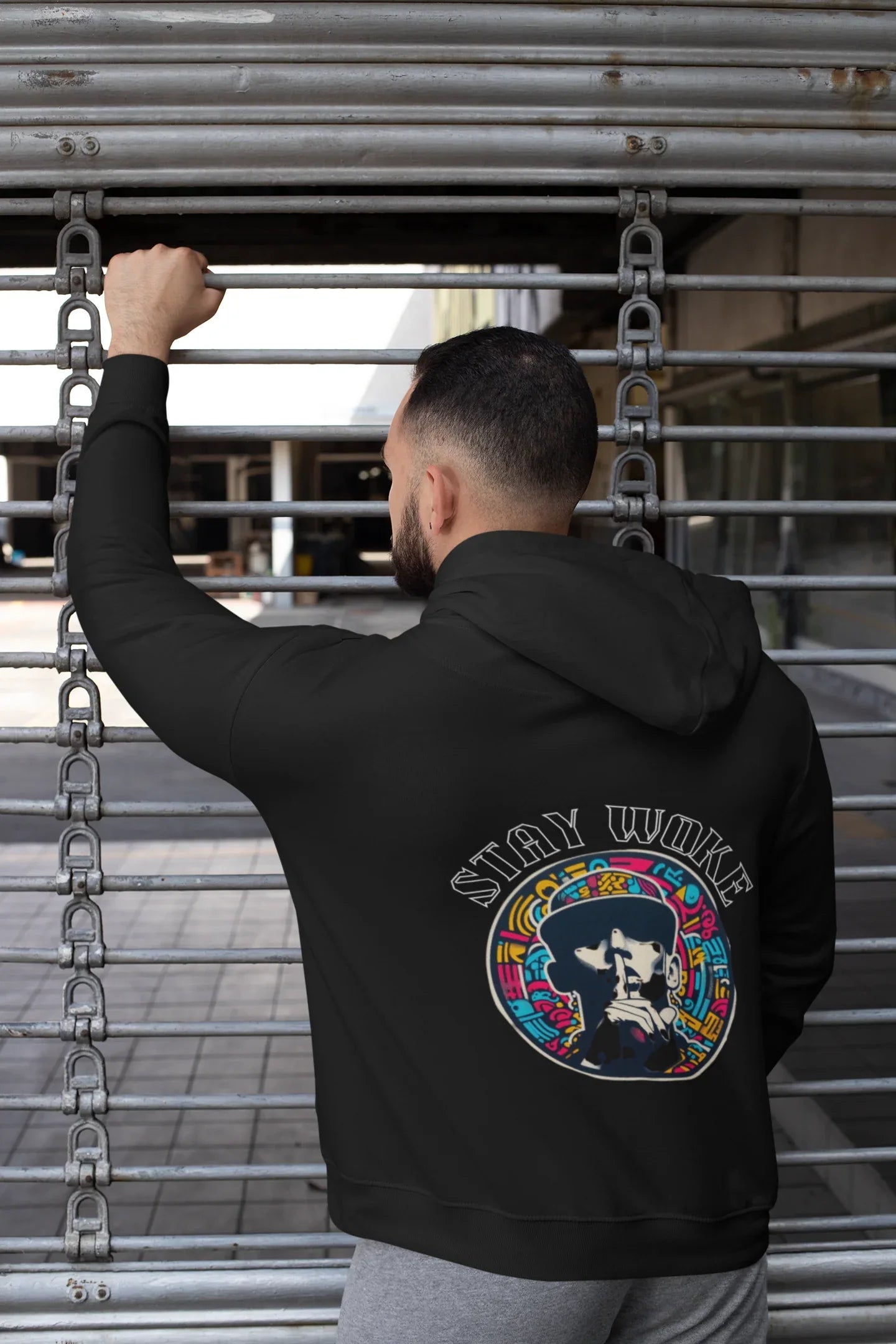 Black hooded sweatshirt with large back logo, long sleeves and hood