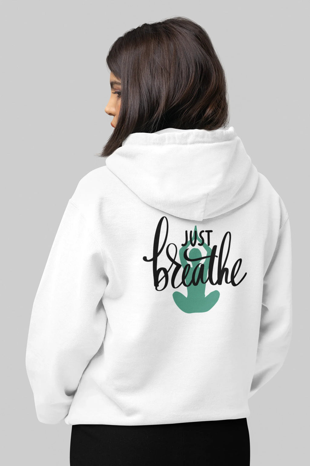 White hoodie with drawstring hood and 'Just Breathe' logo on back