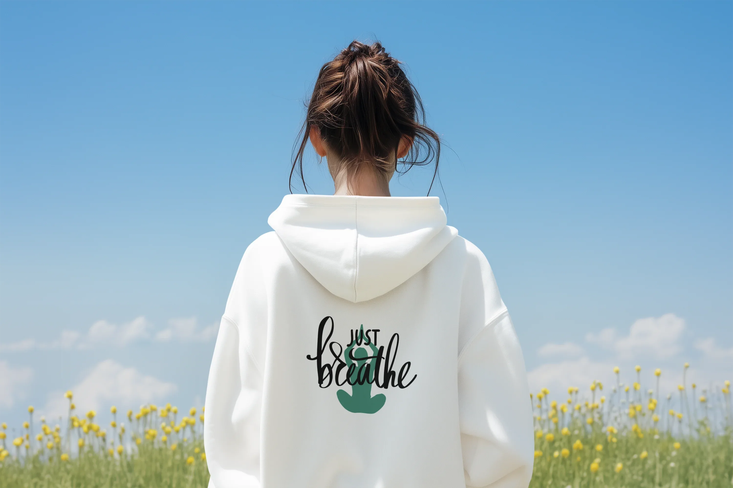 White Just Breathe hoodie with hood and chest graphic on back view