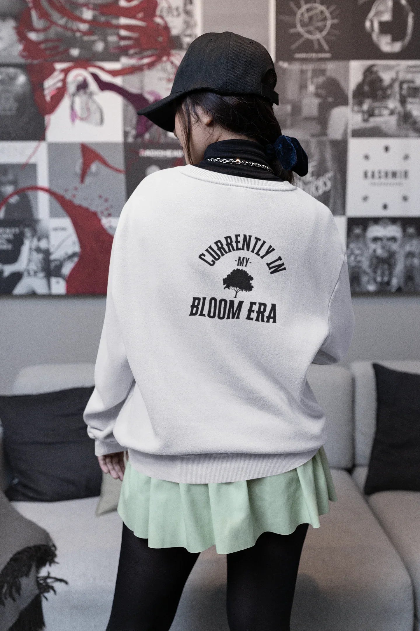 White sweatshirt with crew neck and "Currently in My Bloom Era" back text print