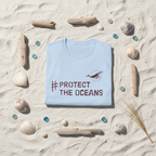 Light blue T-shirt, folded, featuring #PROTECT THE OCEANS chest graphic