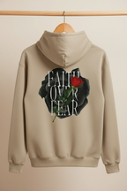 Sand unisex hoodie with hood, front pocket, and Faith over Fear rose back graphic
