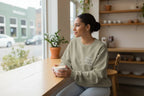 Sage green crewneck sweatshirt with "Good things ahead" chest print